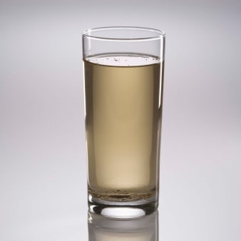 glass of water with iron or rust